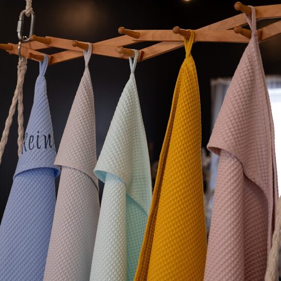 Vafeļauduma dvielis ar kapuci